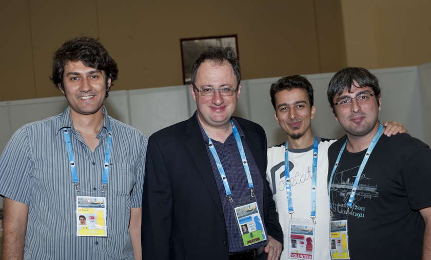 img: left, next to Mr. Boris Gelfand, IGM, former challenger, World Chess Olympiad, Istanbul, Round 7, 2012.09.05, photo by David Llada